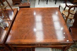 A modern yew wood square coffee table of large proportions