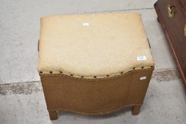 A vintage woven fibre linen stool