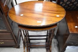 A period style nest of three oval occasional tables