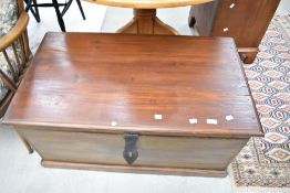 A modern stained frame blanket box having clasp fastener