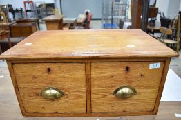 A vintage golden desk top set of two index drawers, stamped 1944