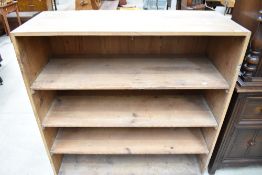 A 19th Century cupboard top adapted to shelf unit, having dove tailed joints