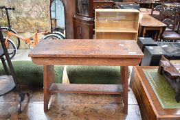 A traditional stained frame stool , possible coffin stool