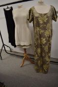 A 1960s Carnegie model shift dress having beading and metallic thread detail to hem, mark to front.