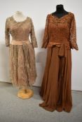 A 1950s Elizebeth Henry, London, lace evening dress with scoop neckline and three quarter sleeves