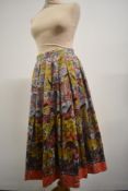 A 1950s novelty horse print cotton skirt having side metal zip.