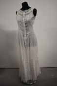 A beautifully detailed Victorian/ Edwardian full length petticoat with lace throughout, blue