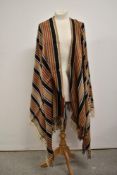 Two antique brightly striped shawls with fringed edge, this has originally been one large shawl