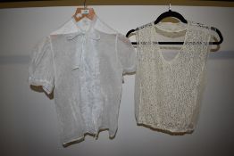 A 1940s organdie blouse having button front with ruffle and pussy bow and a 1930s lace and tulle