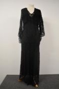 A 1930s black lace bias cut evening gown with silk lining and bolero.