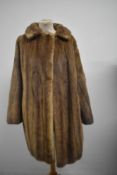 A vintage 1950s blonde mink jacket.
