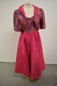 A 1970s David Butler strapless evening dress and matching bolero jacket.