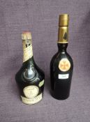 A bottle of Benedictine D.O.M, 43% no capacity stated and a bottle of Sandeman's Sherry no
