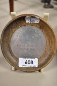 A local interest keep sake, a dish made of Oak from Furness Abbey 1127, Barrow In Furness with HM