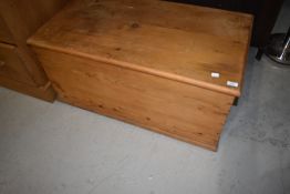 A stripped pine bedding box
