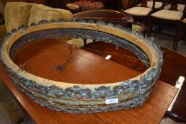 A vintage brass light surround