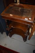 A 19th Century mahogany Davenport style desk having open shelves under