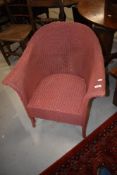 A vintage Lloyd Loom tub chair