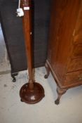 An early 20th Century mahogany standard lamp