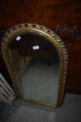 A gilt frame wall mirror