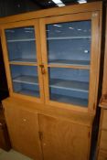 A utility unit, display cabinet over double cupboard, would make a great kitchen cabinet
