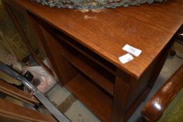 A modern oak bookshelf with glazed section