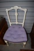 A Victorian bedroom chair, with later paint and upholstery