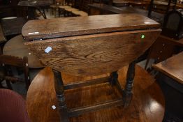 A Reprodux drop leaf coffee table