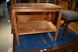 A bleached mahogany side table with undershelf