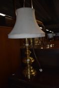 A brass table lamp