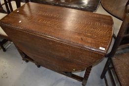 An early 20th Century oak twist gateleg table