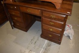 A Victorian style oak desk