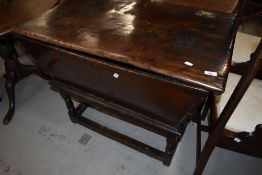 A period dough bin on turned legs, possibly Elm