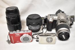 A Nikon D50 digital camera with a Nikon AF-S DX Nikkar ED 18-55mm 1:3,5-5,6 lens, a Sigma DL Macro