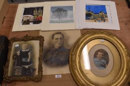 Two early 20th century picture or photo frames including an oval form and one ornate gilt and