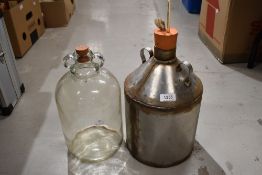A homemade Still and glass demijohn.