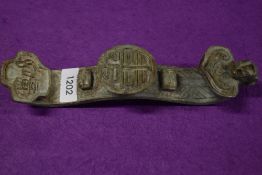 A Chinese carved soapstone Ruyi/Ryu sceptre, of slightly oversized proportions