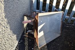 A wheelbarrow etc