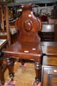 A Victorian mahogany hall chair