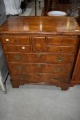 A nice quality reproduction yew wood TV cabinet having faux drawer fronts