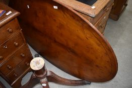 A reproduction Regency yew wood coffee table