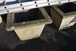 A pair of large concrete planters, width approx 69cm height 55cm, ideal for outdoor Christmas