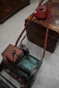 A vintage petrol lawnmower