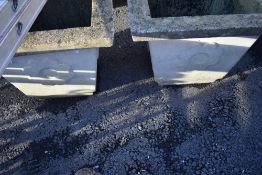 A pair of large concrete planters, width approx 69cm height 55cm, ideal for outdoor Christmas
