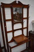 A late 19th/early 20th Century mahogany hall stand