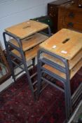 A set of six vintage school or industrial lab stools