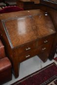 An Art Deco style walnut bureau