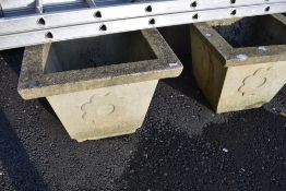 A pair of large concrete planters, width approx 69cm height 55cm, ideal for outdoor Christmas
