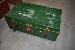 A vintage tin cabin trunk