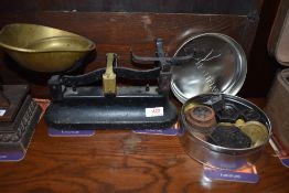 A traditional balance scale and weights